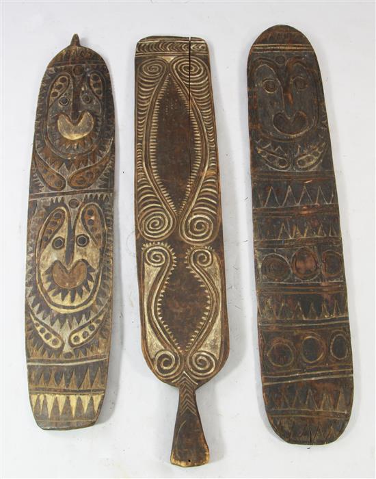 Sepik River carved wooden gope board and two other boards